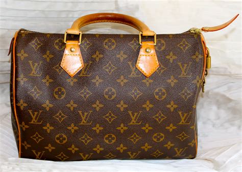 bauletto louis vuitton con lucchetto|Borsa Speedy Louis Vuitton: i bauletti più belli e come .